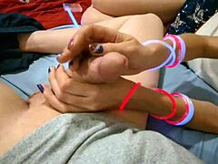 She gives a close-up POV handjob on 4th of July with dripping cum on pretty nails