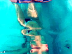 Underwater Lesbian Strap-On Action with Squirting and Ass Licking in Public Pool