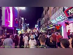 Walking down Walking Street in Pattaya on Halloween 2024 with neon lights shining and sexy costumes all around