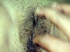 As an excited Indian wife, I prepare for my first anal adventure with my husband in our bedroom, feeling those huge natural tits bounce.