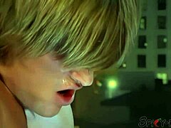 busty blonde sucking two cocks in a vintage orgy scene