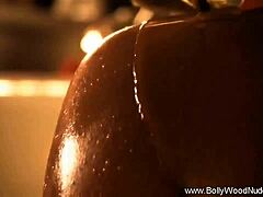 She's aiming for total relaxation in this Bollywood dance with her sensual striptease moves.