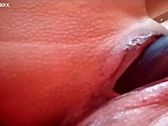 I'm a sensual Latina, uh, masturbating with my dildo on the bed, showing off my wet pussy lips and natural tits in close-up pov while wearing lingerie and spreading legs