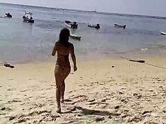 Monika Fox Poses Gracefully in Pink Bikini on Sunny Beach