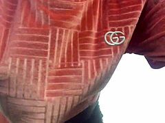 crazy woman twerking partially clothed in a dense forest setting