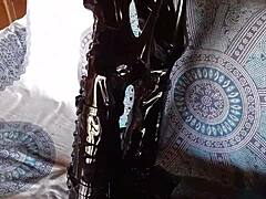 total black with fishnets pantyhose and boots over the knee. hey, check out this all-black outfit with fishnets and knee-high boots