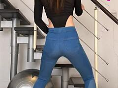 Hey check this sexy chinese babe dancing in those tight jeans music pumping