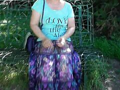 Does this hairy mature's see-through dress reveal her chubby beaver for outdoor flashing thrills?