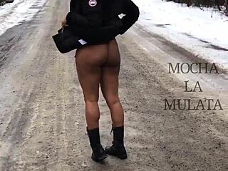 Naughty ebony babe peeing bare in the freezing snow, daring much?